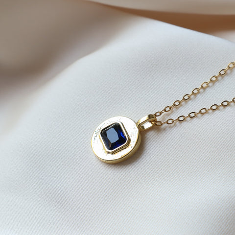 Gold Disc with Blue Stone Necklace