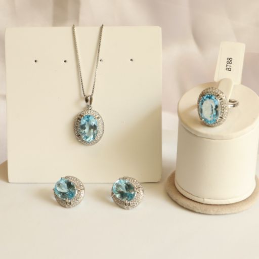 Araliya Blue Topaz Earrings Pendant and RIng Set