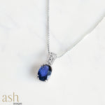Load image into Gallery viewer, Blue Lagoon Sapphire and Diamond Silver Pendant
